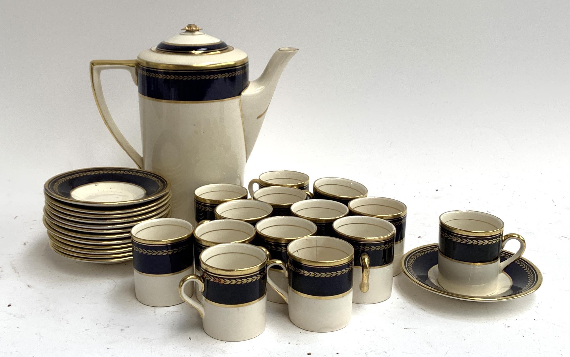 A Simpsons Ambassador ware coffee set, comprising 14 cans, saucers, and a coffee pot