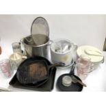 A mixed lot of kitchen items to include Braun coffee bean grinder, skillet, griddle, baking tray,