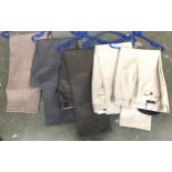 Four pairs of wool blend M&S W40 IL31 trousers, together with a pair of Peter Christian wool silk