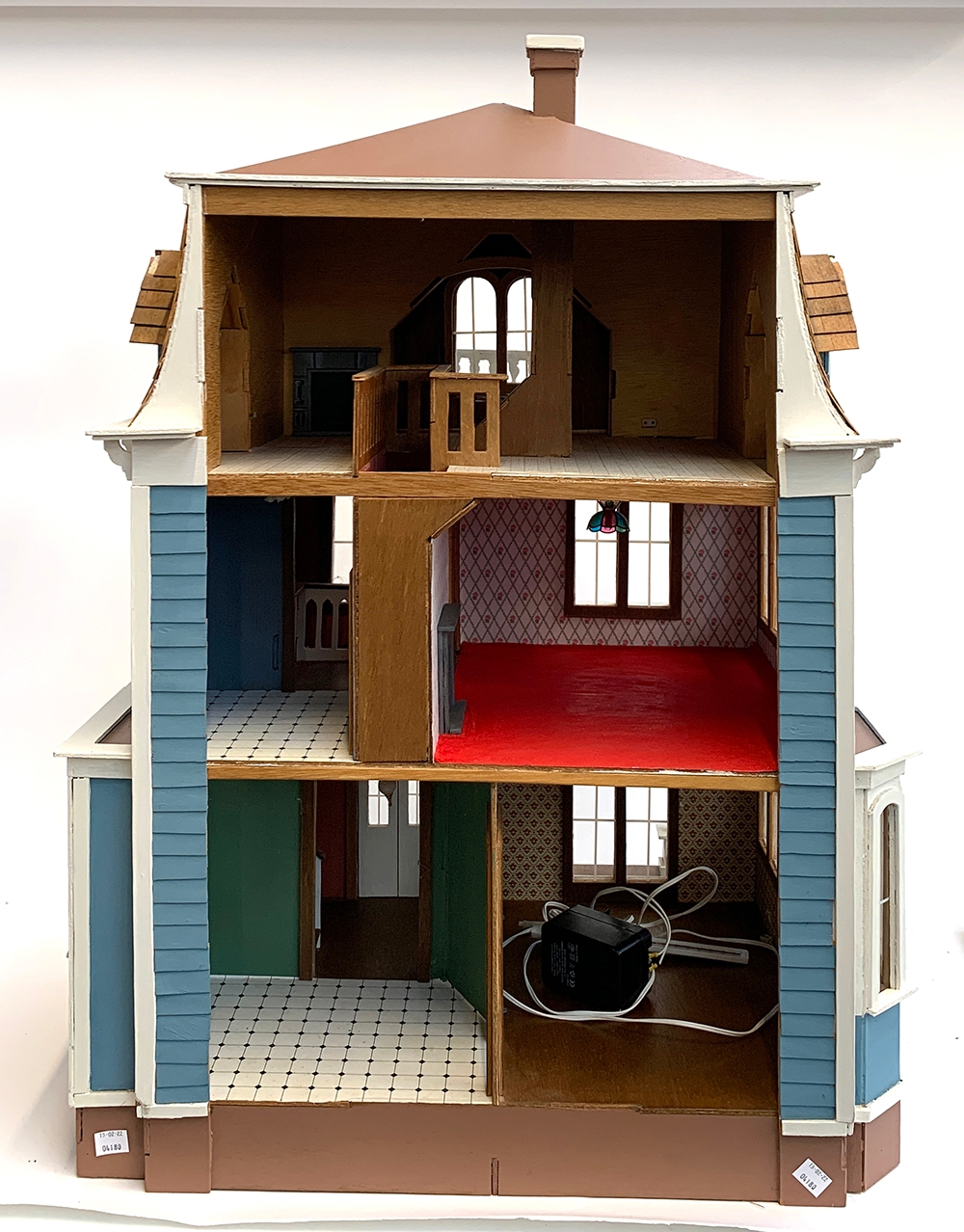 A three storey blue dolls house, 83cmH, 56cmW, 45cmD, partially wired with electricity together with - Bild 3 aus 5