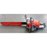 A Mitox 6224 chainsaw with 24in blade together with spanner and manual