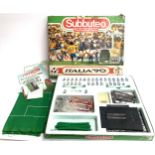 A Subbuteo Italia 90 World Cup edition game to include players, balls, playing pitch etc, box af