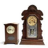 An American Ansonia mantel clock with glazed door and painted scrolling decoration, 56.5cmH,