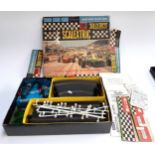 A Scalextric 50s set with track, controllers, barriers, bridge, banking wedges (box af)