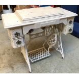 A white painted Singer sewing machine table, with cast iron base, 92x46x78cmH