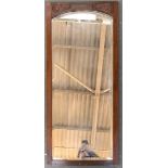 A rectangular mirror with dome top, 99x44cm