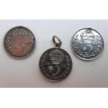 Three maundy three pence pieces all with drilled hole for use as pendants, one set with a small