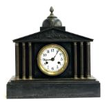 An architectural slate mantel clock, classical pediment, white enamelled dial flanked by 6 reeded