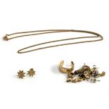 A pair of 9ct gold star earrings; together with a small quantity of other earring backs, etc
