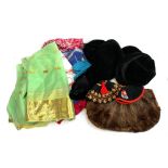 A mixed lot to include vintage hats, textiles, a fur muff and silk lined fur shawl by Faulkes,