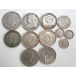 A quantity of pre 1947 silver coins to include Queen Victoria half crown 1880, 1900, one florin