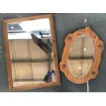 A pine framed rectangular wall mirror with bevelled glass, 81x58cm, together with one other
