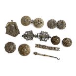 A mixed lot of white metal items to include a Kelt Breton brooch; buckles; brooches; souvenir