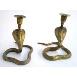 A pair of brass candlesticks in the form of cobras, 22cmH