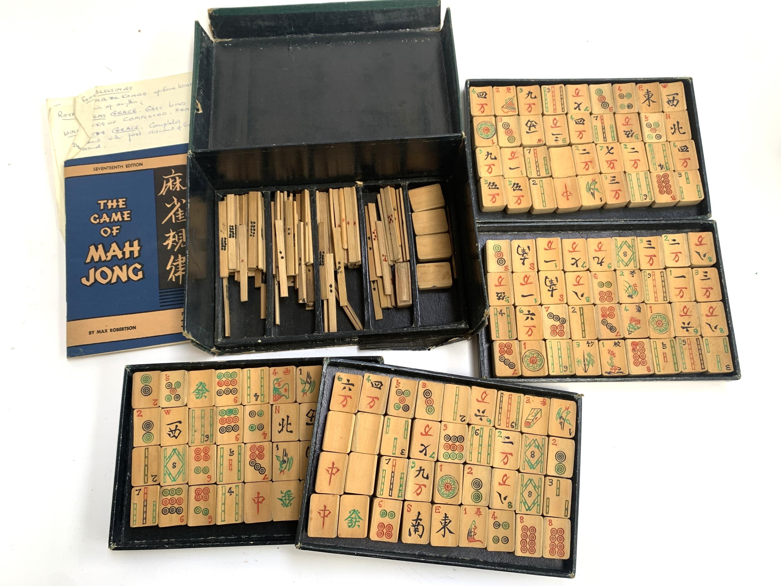 A mahjong set, Shanghai consisting of tiles, dice, scoring sticks together with a Max Robertson rule