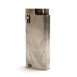 An engine turned white metal lighter by Savinelli, 6.8cmH