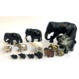 A mixed lot of elephant figurines to include brass, enamel, carved wood, Pietra Dura etc