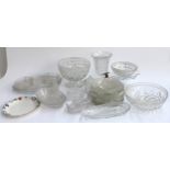 A large quantity of cut glass items to include fruit bowls, vase, jam pot, trinket pot, bottle,