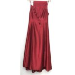 An Occasions size 12 evening dress and wrap, together with a black silk evening dress and a BooHoo