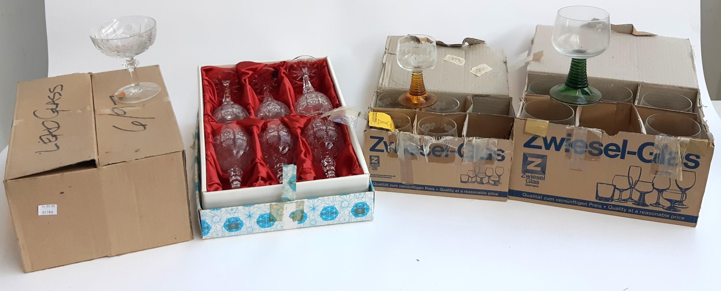 A boxed set of 6 Bohemia hand cut lead crystal wine glasses, together with a quantity of Zweisel-