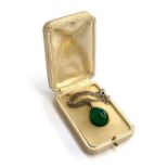 An Art Deco silver and chrysoprase egg shaped pendant, the chain 41cmL, in a fitted case for A. Marx