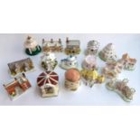 A lot of sixteen various Coalport ceramic cottages to include The Alms Houses, Rose Arbour, The