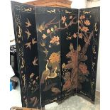 A Chinese carved four-fold screen, depicting birds amongst foliage, each panel 41x183cm