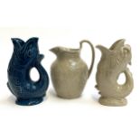 A Dartmouth blue glaze glug jug, 23cmH, together with a Wedgwood glug jug, 22.5cmH, and matching