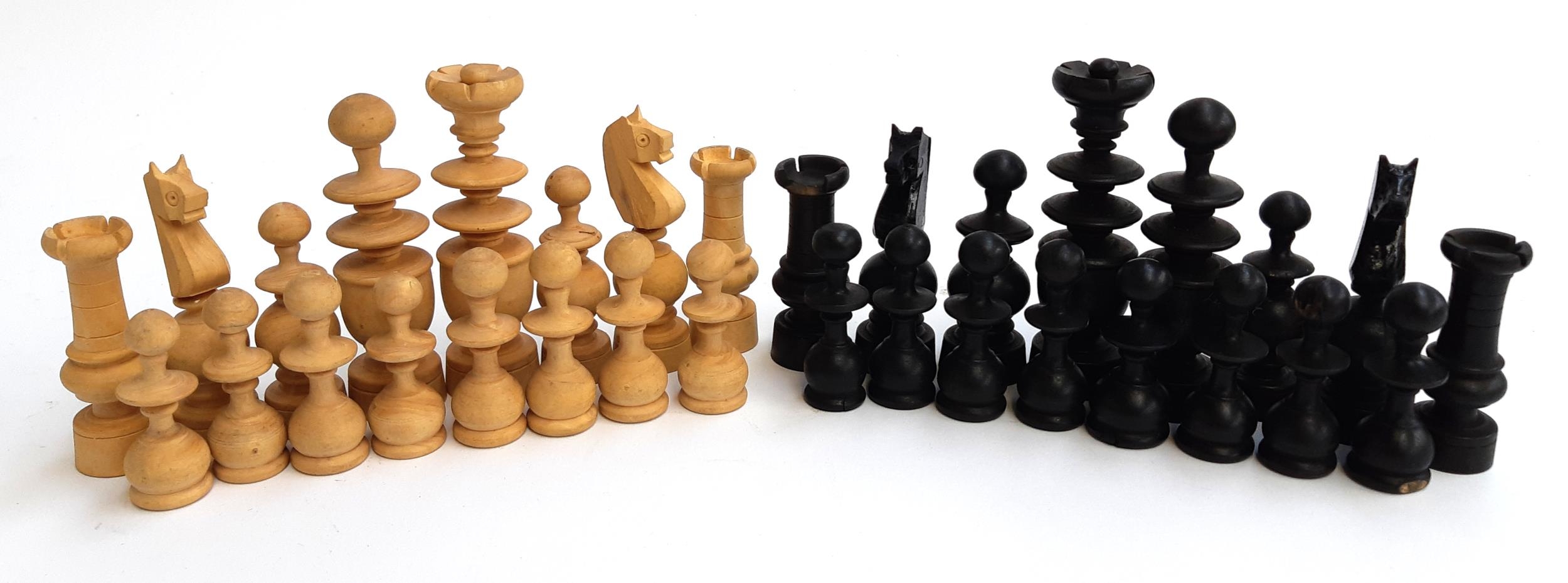 A wooden chess set, the tallest piece approx. 8cmH