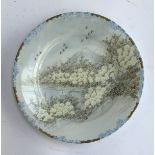 A Japanese hand painted plate depicting Mt. Fuji, marks to base, 23.5cmD