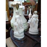 A pair of figural porcelain table lamps (af), 44cmH to top of fitting