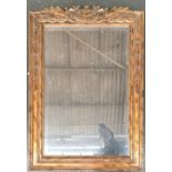 A gilt framed wall mirror, of recent manufacture, with bevelled glass, 95x66cm