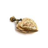 A yellow metal heart locket, engraved with foliate detail and monogrammed 'H.H 1905', approx. 3.8g