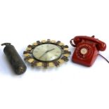 A vintage red rotary dial telephone, labelled Upway 2646, a Metamec quartz wall clock and an antique