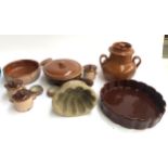 A mixed lot of mainly French terracotta cooking pots, together with a stoneware jelly mould