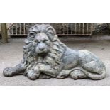 A cast iron boot scraper in the form of a recumbent lion, 67x29x36cmH