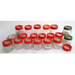 A large quantity of glass Kilner jars
