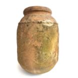 A large terracotta storage jar, possibly for olives, 41cmH, with wooden stand