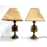 A pair of brass table lamps (one missing loop handles), height to top of fitting 34cmH
