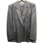 A Pierre Cardin two piece navy wool suit, size 46R, with jacket cover