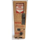 A vintage Nestle Confectionery milk chocolate dispenser, with original key, manufactured by