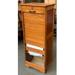 A Victorian light oak tambour fronted filing cabinet, with slides, on bracket feet, (tambour present