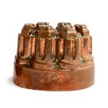 A Victorian Benham & Froud copper jelly mould, of fluted turret form, shape no. 486, 15cmL