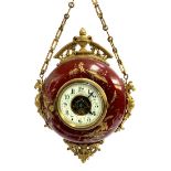 A French toleware wall hanging clock, circa 1900, with ormolu mounts, enamel dial with Arabic