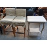 A pair of light oak upholstered bar stools; together with a white painted occasional table