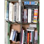 Two boxes of books relating to The Beatles, together with a small quantity of CDs