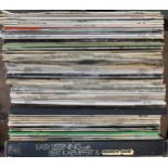 A mixed red box of vinyl LPs to include music from the 50s, 60s etc