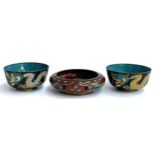 A pair of Chinese 20th century cloisonne enamel bowls, dragons on a black ground, each 11cmD 5.5cmH;