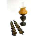 An oil lamp with yellow glass shade, with chimney, 53.5cmH, together with a quantity of horse