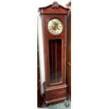 A 20th century long case clock, Roman numerals, the trunk with bevelled glass, 205cmH